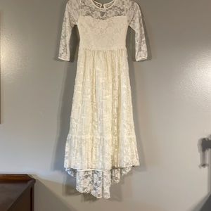 flower girl or first communion dress size 12-14. Light off white color.